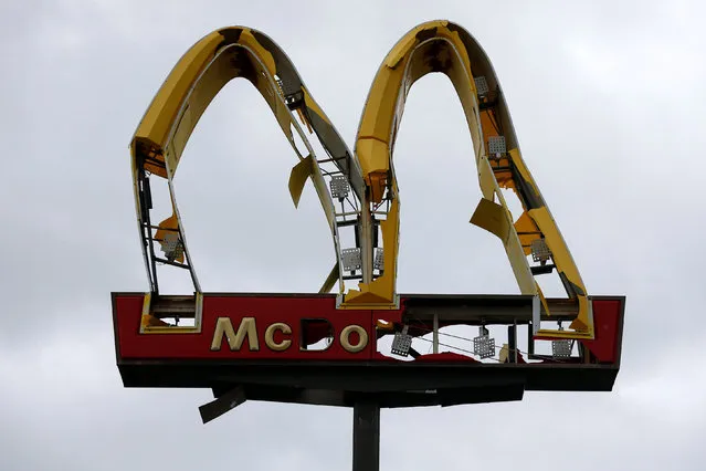 A McDonald's sign damaged by Hurricane Michael is pictured in Panama City Beach, Florida, U.S. October 10, 2018. (Photo by Jonathan Bachman/Reuters)