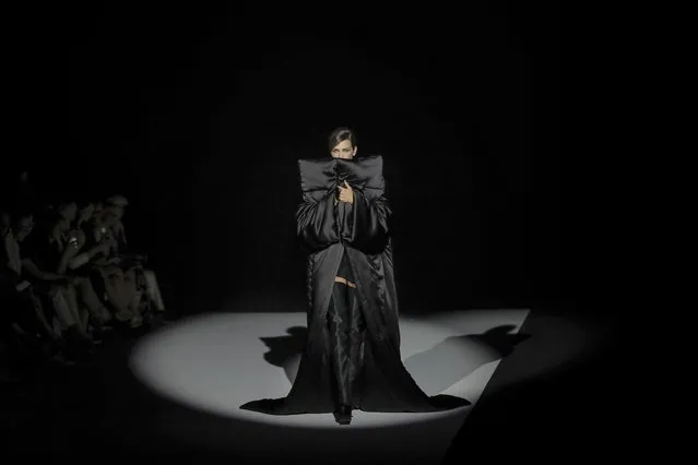 A model wears a creation as part of Stephane Rolland's Haute Couture Fall/Winter 2022-2023 fashion collection presented Tuesday, July 5, 2022 in Paris. (Photo by Lewis Joly/AP Photo)