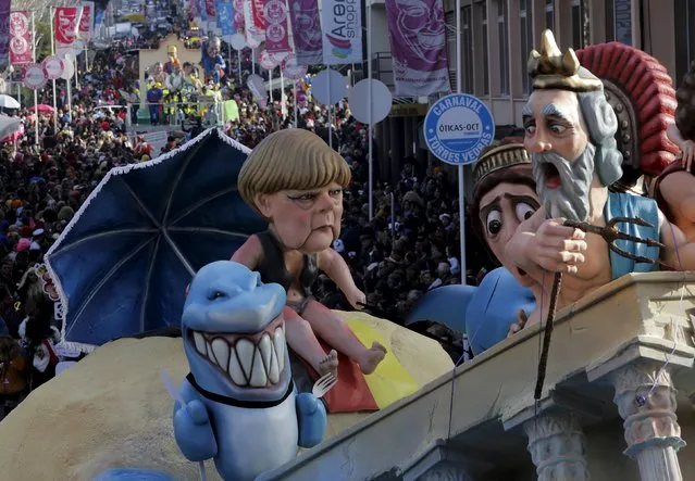 A float depicting a figure of German Chancellor Angela Merkel is seen during the carnival parade in Torres Vedras, Portugal February 7, 2016. (Photo by Hugo Correia/Reuters)
