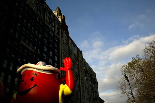 The Kool-Aid Man balloon floats in the parade. (Photo by Todd Heisler/The New York Times)