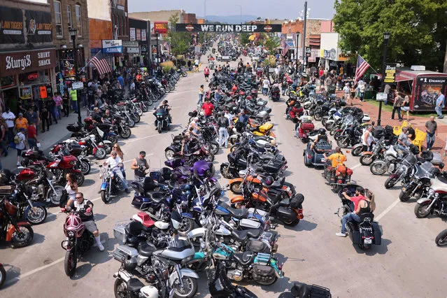 Motorcycle enthusiasts attend the 81st annual Sturgis Motorcycle Rally on August 8, 2021 in Sturgis, South Dakota. The rally is expect to draw more than 500,00 people during its 10-day run. (Photo by Scott Olson/Getty Images)