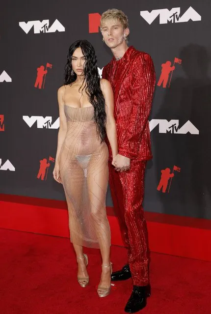 US actress Megan Fox (L) and US singer Machine Gun Kelly arrive for the 2021 MTV Video Music Awards at Barclays Center in Brooklyn, New York, September 12, 2021. (Photo by Andrew Kelly/Reuters)