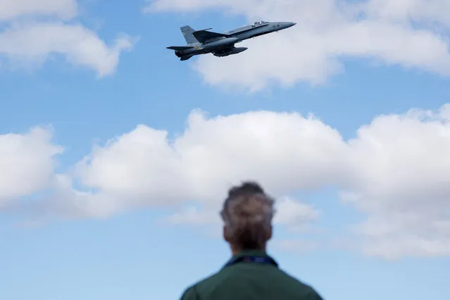 A pilot of the Spanish air forces observes the Ocean Sky 2023 Military Exercise for advanced air-to-air training in the southern airspace of the Canary Islands, Spain on October 25, 2023. (Photo by Borja Suarez/Reuters)