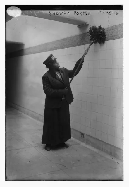 An African American woman dusts as she works as a porter at a subway station in New York City, United States, circa 1917, in this Library of Congress handout photo. (Photo by Reuters/Bain Collection/Library of Congress)