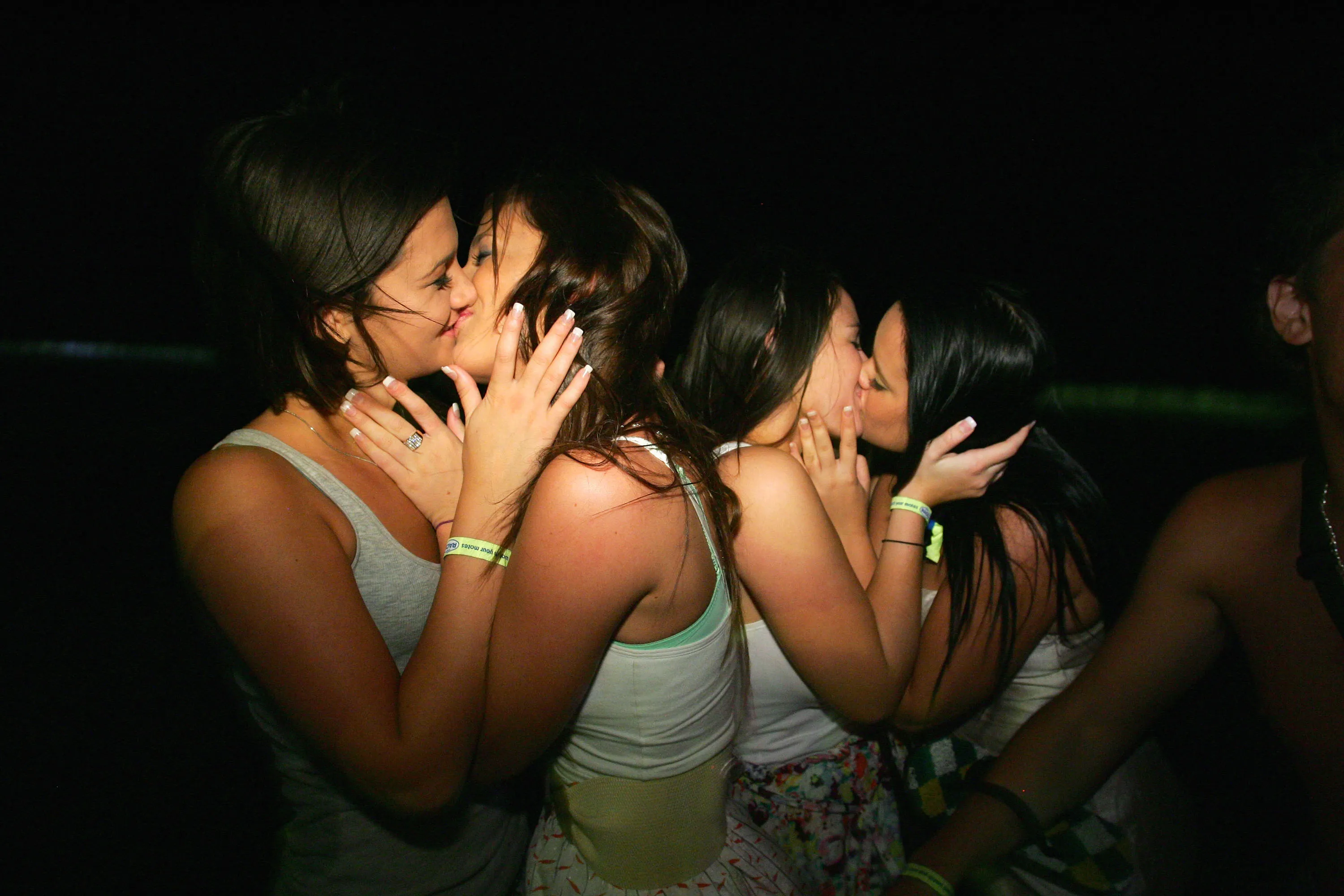 Coeds kissing