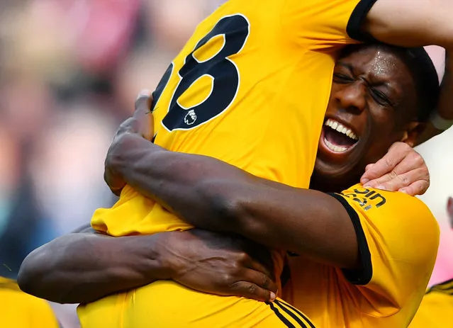 Willy Boly of Wolverhampton Wanderers celebrates after scoring his team's first goal during the Premier League match between Southampton FC and Wolverhampton Wanderers at St Mary's Stadium on April 13, 2019 in Southampton, United Kingdom. (Photo by Dylan Martinez/Reuters)