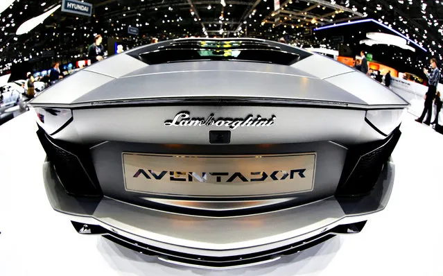 The rear of Lamborghini Aventador is pictured during the media day ahead of the 84th Geneva Motor Show at the Palexpo Arena in Geneva March 5, 2014. (Photo by Arnd Wiegmann/Reuters)