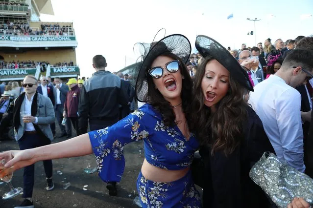Racegoers during the Grand National Festival at Aintree Racecourse on April 7, 2017 in Liverpool, England. (Photo by WENN)