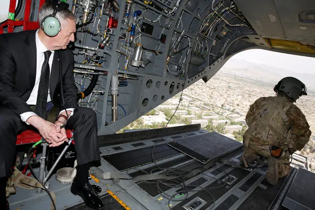 U.S. Defense Secretary James Mattis looks out over Kabul as he arrives via helicopter at Resolute Support headquarters in Kabul, Afghanistan April 24, 2017. (Photo by Jonathan Ernst/Reuters)