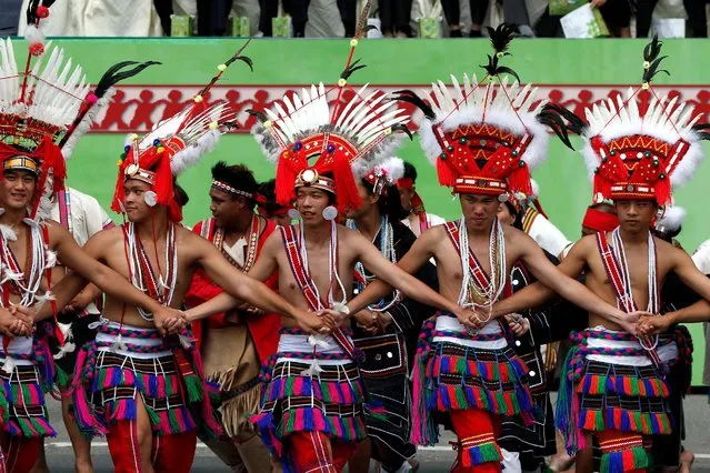 Indigenous Taiwanese dance during a parade to reflect Taiwan's history as part of an inauguration ceremony of Taiwan’s President Tsai Ing-wen in Taipei, Taiwan May 20, 2016. (Photo by Tyrone Siu/Reuters)