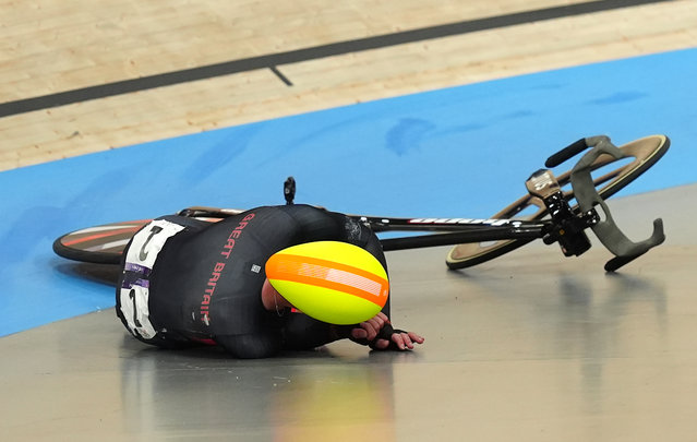 Great Britain's Oliver Wood crashes after a collision in the Men's Madison Final at the National Velodrome, Saint-Quentin-en-Yvelines, on the fifteenth day of the 2024 Paris Olympic Games in France on Saturday,(Photo by David Davies/PA Wire)