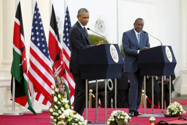 U.S. President Barack Obama (L) pauses during his remarks at a news conference with Kenya's President Uhuru Kenyatta after their meeting at the State House in Nairobi July 25, 2015. (Photo by Jonathan Ernst/Reuters)