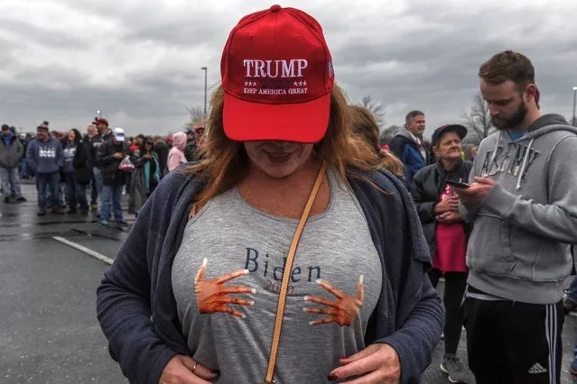 A supporter of U.S. President Donald Trump wears a t-shirt depicting a pair of groping hands with “Biden 2020” displayed before a Trump rally in Hershey, Pennsylvania, U.S. on December 10, 2019. (Photo by Stephanie Keith/Reuters)