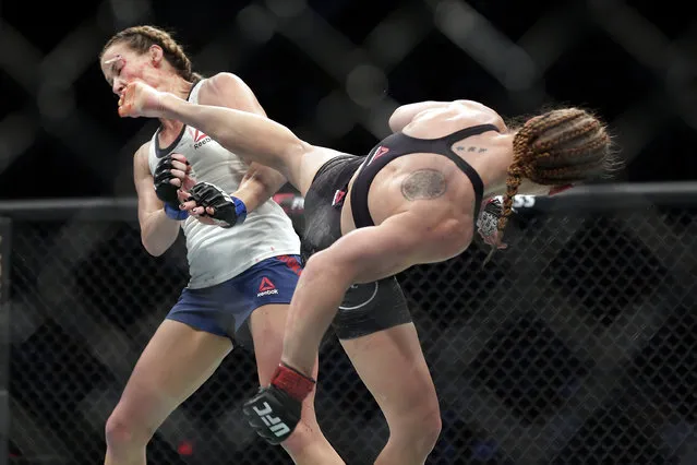 Valentina Shevchecko, right, lands a heel kick to Katlyn Chookagian's face during a women's flyweight mixed martial arts bout at UFC 247 on Saturday, February 8, 2020, in Houston. (Photo by Michael Wyke/AP Photo)