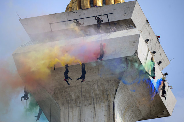 Soldiers perform during a parade marking the 79th anniversary of the Indonesian Armed Forces in Jakarta, Indonesia, Saturday, October 5, 2024. (Phoot by Tatan Syuflana/AP Photo)