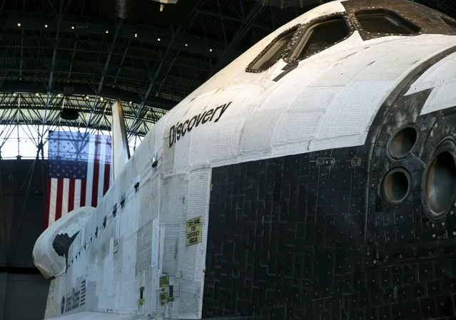 The fuselage of the space shuttle orbiter Discovery is seen on display at the Udvar-Hazy Smithsonian National Air and Space Annex Museum in Chantilly, Virginia August 28, 2015. (Photo by Gary Cameron/Reuters)