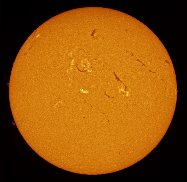 “Our sun”. Winner: Mercury Rising by Alexandra Hart (UK) On 9 May 2016, the Transit of Mercury occurred, with the smallest planet in the solar system passing directly between the Earth and the sun over the course 7.5 hours – the longest transit of the century. Mercury can be seen towards the centre of our star in the image as a tiny black dot. Preston, Lancashire, UK, 9 May 2016 TEC140 140 mm f/7 refractor telescope at f/9.8, Solarscope DSF100 H-alpha filter, Sky-Watcher EQ6 Pro mount, PGR Grasshopper 3 camera, stacked from multiple exposures. (Photo by Alexandra Hart/Insight Astronomy Photographer of the Year 2017)