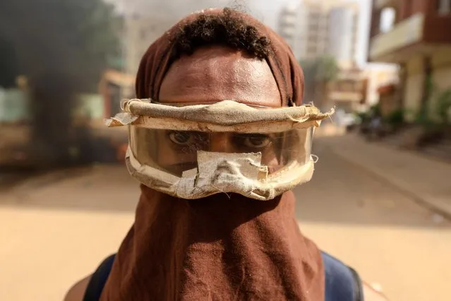 A protester looks on during a rally against the military rule following the last coup, in Khartoum, Sudan on September 13, 2022. (Photo by Mohamed Nureldin Abdallah/Reuters)