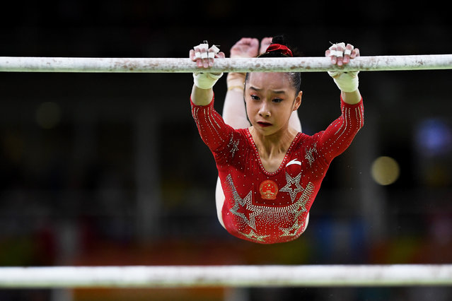 Yilin Fan of China competes on the uneven bars during Women's qualification for Artistic Gymnatics on Day 2 of the Rio 2016 Olympic Games at the Rio Olympic Arena on August 7, 2016 in Rio de Janeiro, Brazil. (Photo by David Ramos/Getty Images)