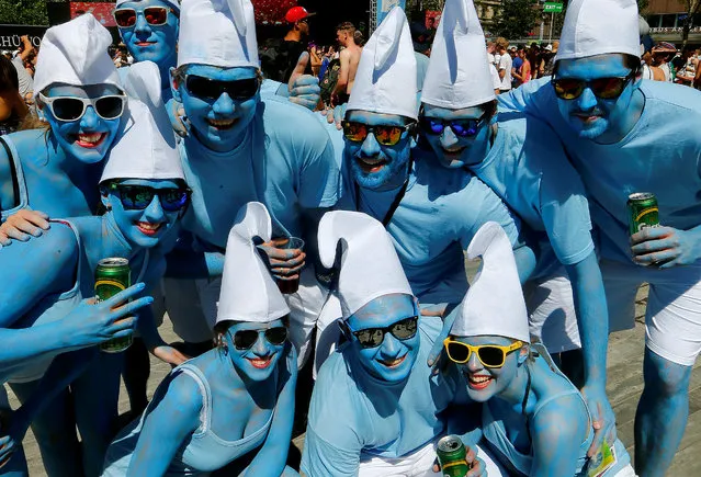 Revellers pose during the Street Parade dance music event in Zurich, Switzerland August 13, 2016. (Photo by Arnd Wiegmann/Reuters)