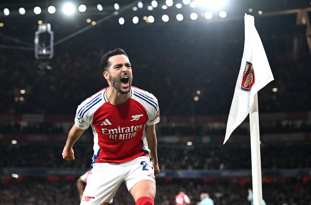 Mikel Merino of Arsenal celebrates scoring his team's third goal during the UEFA Champions League 2024/25 Quarter Final First Leg match between Arsenal FC and Real Madrid C.F. at Emirates Stadium on April 08, 2025 in London, England. (Photo by Stuart MacFarlane/Arsenal FC via Getty Images)