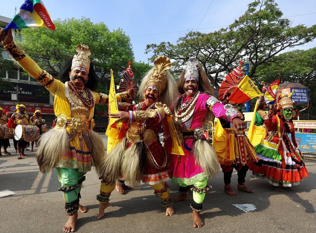 Indian folk artists perform during the procession held in celebration of the 2623th birth anniversary of the 24th Tirthankara of Jainism, Lord Mahavir Jayanthi, in Bangalore, India, 10 April 2025. Jain devotees and their family members took part in the spiritual procession rally to spread the teachings of Lord Mahavir, pertaining to non-violence, truth, compassion, and self-discipline. (Photo by Jagadeesh N.V./EPA)