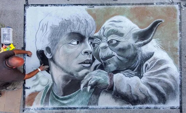 David Lepore of Boynton Beach works to finish his depiction of a “Star Wars” scene with Luke Skywalker and Yoda. (Photo by Thomas Cordy/The Palm Beach Post)