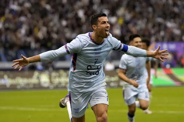 Cristiano Ronaldo celebrates after scoring his side's second goal playing for a combined XI of Saudi Arabian teams Al Nassr and PSG during a friendly soccer match, at the King Saud University Stadium, in Riyadh, Saudi Arabia, Thursday, January 19, 2023. (Photo by Hussein Malla/AP Photo)