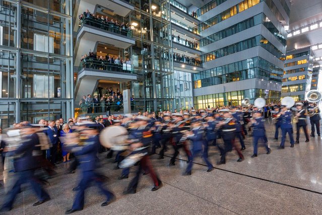 The Belgian military brass band arrives at the beginning of NATO’s 75th Anniversary Celebration in the Agora to commemorate 75 years of NATO foundation during a North Atlantic Treaty Organization (NATO) Foreign Affairs Ministers meeting in Brussels, Belgium, 04 April 2024. Allied Foreign Affairs Ministers attend a meeting of NATO Ministers of Foreign Affairs at NATO Headquarters in Brussels on 03-04 April as NATO celebrates its 75th anniversary. On 04 April 1949, the 12 founding countries signed the North Atlantic Treaty, called the Washington Treaty. It committed each member to share the risk, responsibilities, and benefits of collective defense. (Photo by Olivier Matthys/EPA/EFE)
