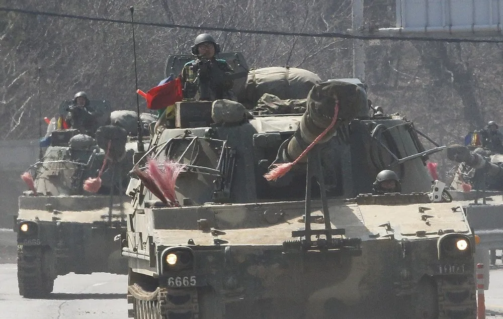 Combat Ready – North Korea Vows “to Settle Accounts” with U.S. (39 Photos)