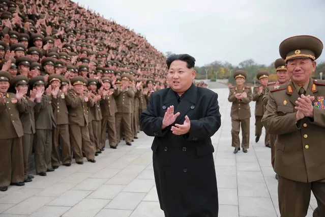 North Korean leader Kim Jong Un takes a memorial picture with attendants at KPA's (Korean People's Army) 7th military education convention, in this undated photo released by North Korea's Korean Central News Agency (KCNA) in Pyongyang on November 7, 2015. (Photo by Reuters/KCNA)