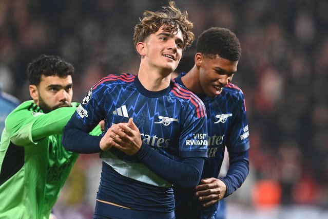 Arsenal's Spanish goalkeeper #01 David Raya, Arsenal's Brazilian defender #06 Gabriel Magalhaes and Arsenal's English midfielder #56 Max Dowman celebrate after the UEFA Champions League - league phase day 4 football match between Slavia Prague and Arsenal FC in Prague, Czech Republic on November 4, 2025. (Photo by Michal Cizek/AFP Photo)