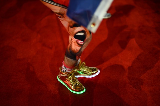 An attendee wears an illuminated pair of shoes on Day 2 of the RNC in Milwaukee on July 16, 2024. (Photo by Ricky Carioti/The Washington Post)