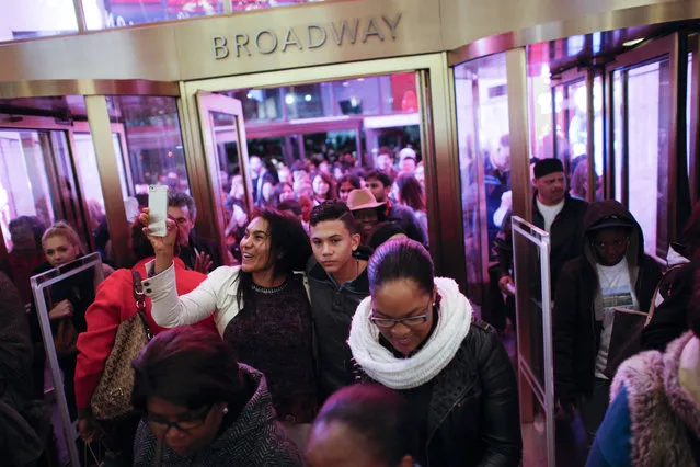 Customers stream into Macy's flagship store in Herald Square on Thanksgiving evening for early Black Friday sales on November 26, 2015 in New York City. Security has been heightened in Herald Square and around the city as thousands of shoppers flock to stores for sales on the kickoff to the Christmas shopping season. (Photo by Kena Betancur/Getty Images)