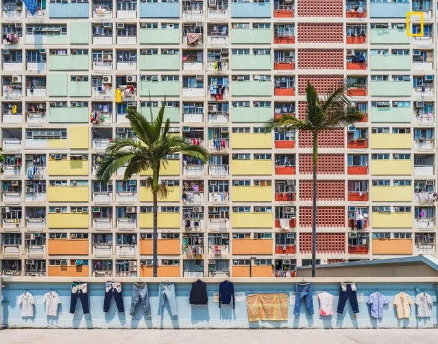 “Village of Rainbow”. “Choi Hung estate, literally meaning “the Village of Rainbow” in Cantonese, is a neighborhood with a vivid paint job in Kowloon, Hong Kong. Look how the drying laundry resembled Emojis!”. (Photo by Haitong Yu/National Geographic Travel Photographer of the Year Contest)