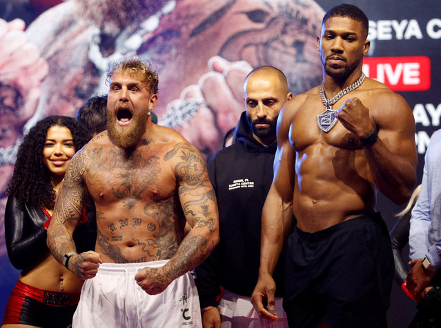 Jake Paul and Anthony Joshua during a public weigh-in at the Fillmore Miami Beach, Florida. Anthony Joshua will take on YouTuber-turned-boxer Jake Paul in a heavyweight bout in Miami on December 18, 2025. (Photo by Marco Bello/Reuters)