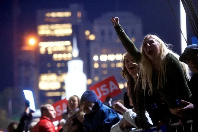 (L-R) Brooke Hart and Shannon Over, both 17, react during U.S. Democratic presidential candidate Hillary Clinton's speech at her final rally at Independence Hall on the eve of election day in Philadelphia, Pennsylvania November 7, 2016. (Photo by Mark Makela/Reuters)