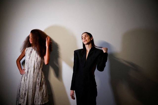 Models prepare backstage for the show of the brand Normando during Sao Paulo Fashion Week in Sao Paulo, Brazil on October 16, 2024. (Photo by Amanda Perobelli/Reuters)