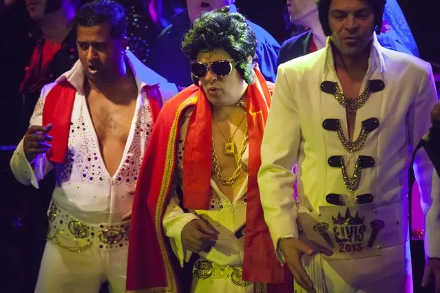 Contestants sing and dance together at the end of the 20th annual Seattle Invitationals, an amateur Elvis impersonator competition, in Seattle, Washington January 23, 2015. (Photo by David Ryder/Reuters)