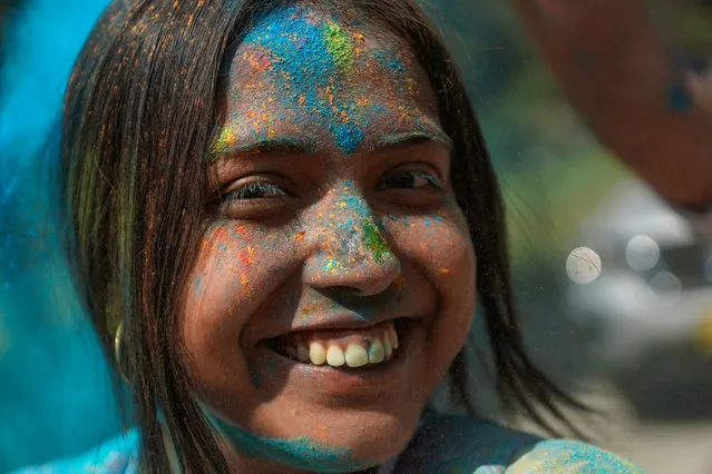 Salvadorans and members of the India community in El Salvador, participate in the celebration of the traditional Hindu Holi Festival in a park in the historic center, in San Salvador, El Salvador, on March 04, 2023. The Embassy of India in El Salvador, Guatemala and Honduras, and the Ministry of Culture of El Salvador, organize the celebration of the Holi Festival 2023. Holi is a popular Hindu spring festival celebrated in India, Nepal and some communities of Indian origin in the Caribbean and South America dedicated to color. (Photo by Alex Pena/Anadolu Agency via Getty Images)