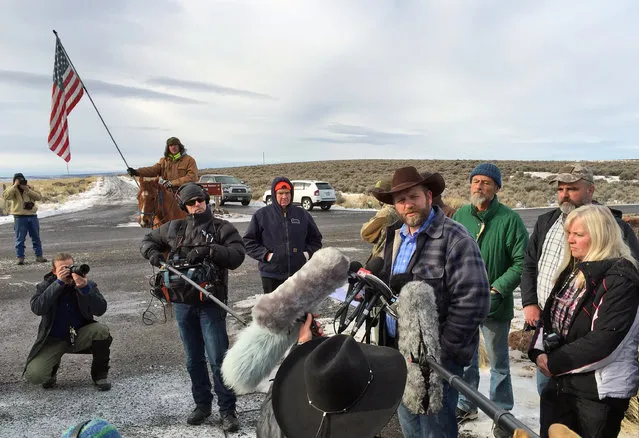 Ammon Bundy speaks to reporters at the Malheur National Wildlife Refuge in Burns, Ore., on Thursday, January 14, 2016. Bundy is the leader of a small, armed group that has been occupying the remote refuge in Oregon since Jan. 2 to protest federal land policies. (Photo by Keith Ridler/AP Photo)