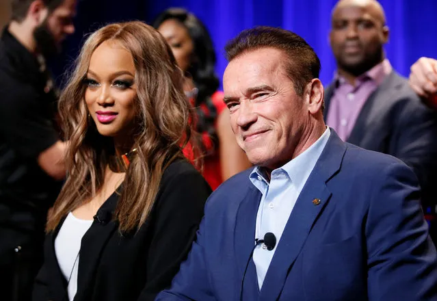 Host Arnold Schwarzenegger (R) and Tyra Banks participate in a panel for “The New Celebrity Apprentice” in Universal City, California, December 9, 2016. (Photo by Danny Moloshok/Reuters)