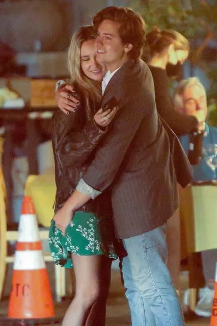 American actor Cole Sprouse can't keep his hands off his new girlfriend Ari Fournier as they wait for their ride after a dinner date in Echo Park, CA. on Memorial Day weekend May 30, 2021. (Photo by Backgrid USA)