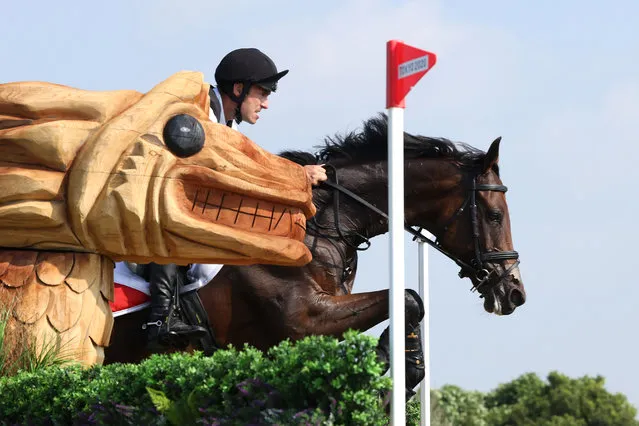 Felix Vogg of Team Switzerland riding Colero clears a jump during the Eventing Cross Country Team and Individual on day nine of the Tokyo 2020 Olympic Games at Sea Forest Cross-Country Course on August 01, 2021 in Tokyo, Japan. (Photo by Leon Neal/Getty Images)