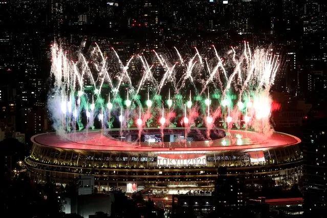 Fireworks explode during the opening ceremony of the Tokyo 2020 Paralympic Games at the Olympic Stadium on August 24, 2021 in Tokyo, Japan. (Photo by Kim Kyung-Hoon/Reuters)