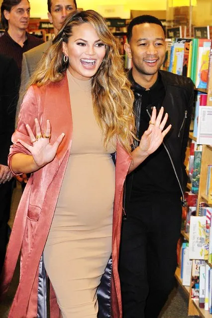 Chrissy Teigen and John Legend attend the book signing for Chrissy Teigen's new book “Cravings: Recipes For All The Food You Want To Eat” at Barnes & Noble at The Grove on February 23, 2016 in Los Angeles, California. (Photo by Jerod Harris/Getty Images)