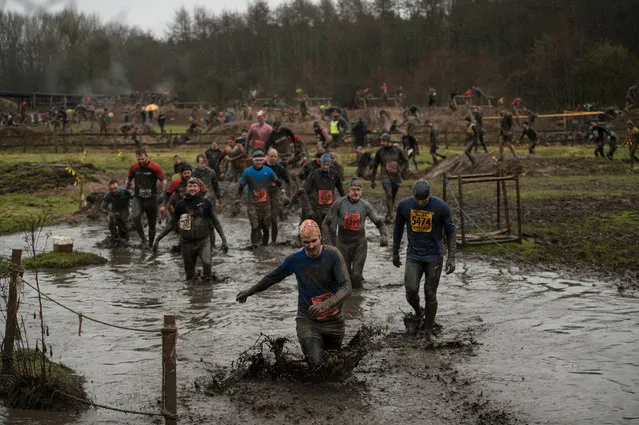 Competitors take part in the “Tough Guy” adventure race near Wolverhampton, central England, on January 29, 2017. (Photo by Oli Scarff/AFP Photo)