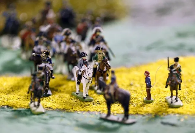 A figurine representing French Emperor Napoleon (C on white horse) is seen on a 40-square-metre miniature model of the June 18, 1815 Waterloo battlefield, in Diest, Belgium, in this picture taken on April 29, 2015. (Photo by Francois Lenoir/Reuters)