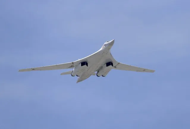 A Tupolev Tu-160 Blackjack strategic bomber flies over the Red Square during the Victory Day parade in Moscow, Russia, May 9, 2015. (Photo by Reuters/Host Photo Agency/RIA Novosti)