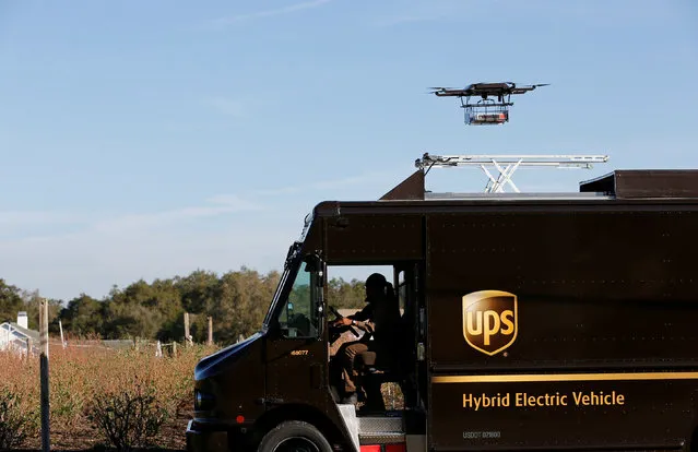 A drone demonstrates delivery capabilities from the top of a UPS truck during testing in Lithia, Florida, U.S. February 20, 2017. (Photo by Scott Audette/Reuters)
